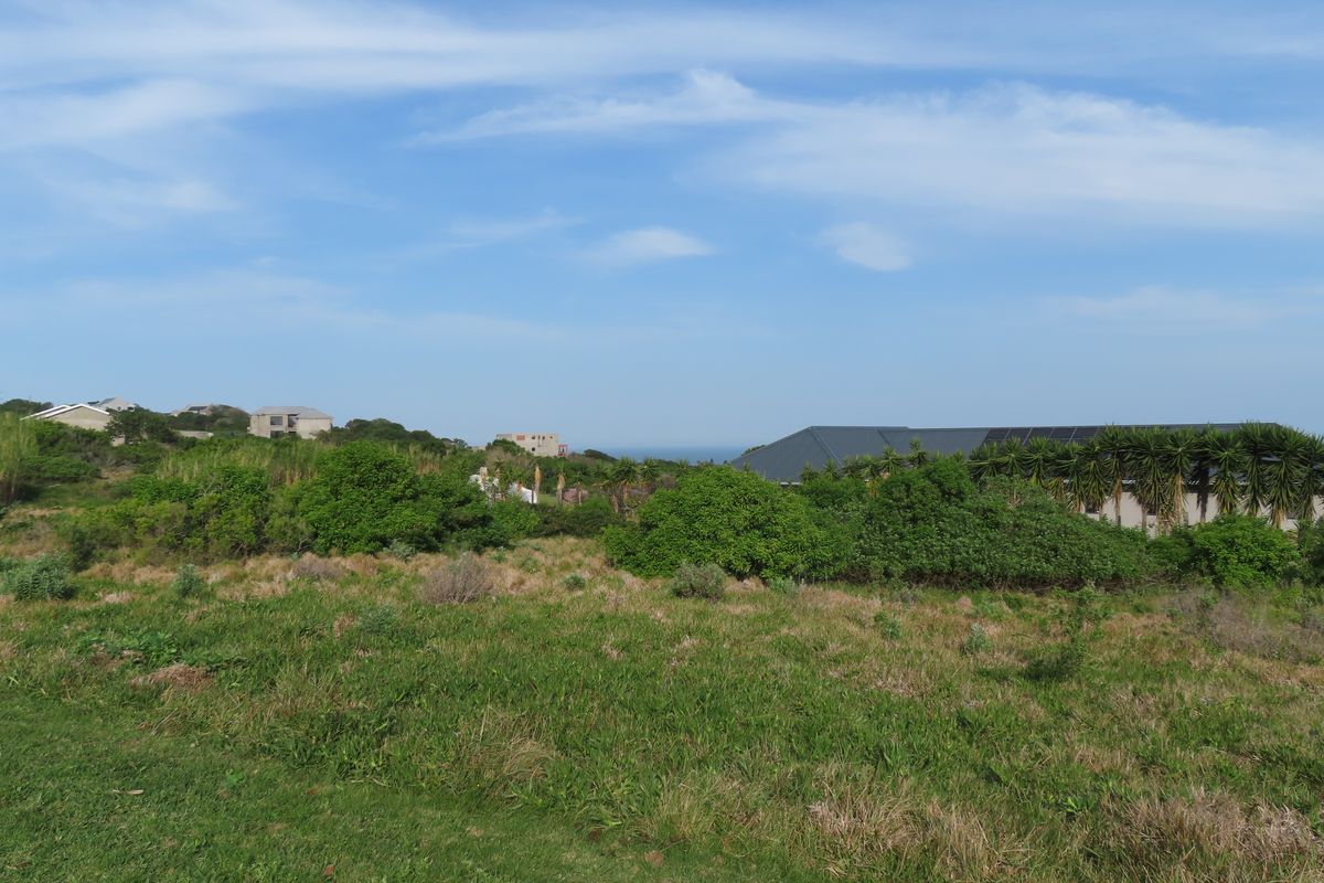 A view of the surrounding residential landscape and coastal horizon from the vacant residential land plot.