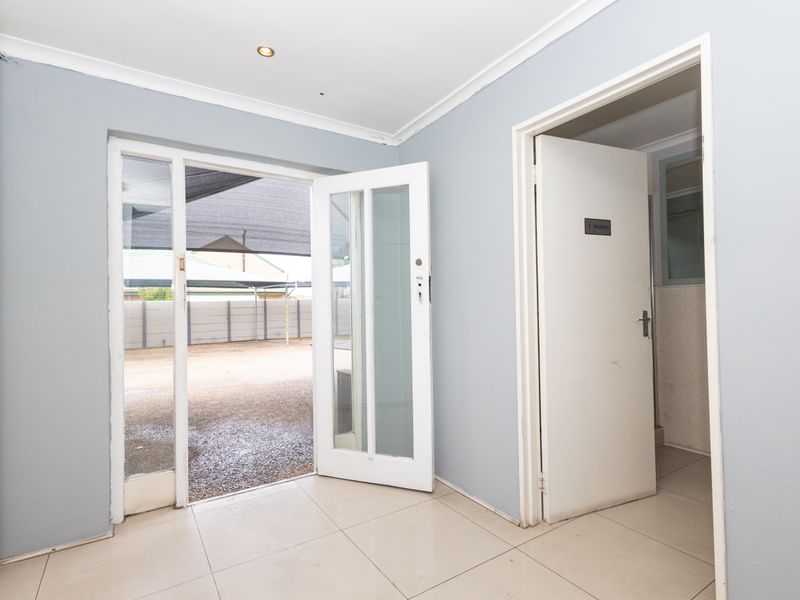 Prime Corner-Plot Property with Exceptional Business and Development Potential! - Photo 9