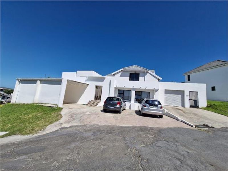 Expansive Coastal Home with 2 flats in Secure Cove Rock Estate - Photo 4