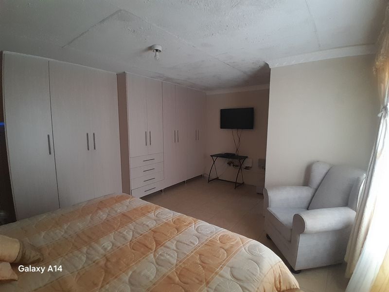 4 Bedroom Family Home with Security Cameras in Harmony Park Piet Retief - Photo 4