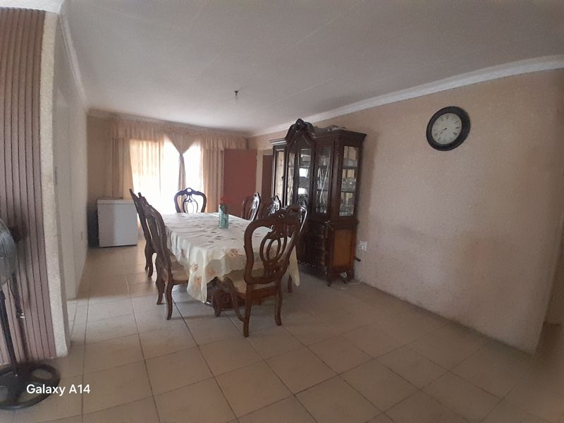 4 Bedroom Family Home with Security Cameras in Harmony Park Piet Retief - Photo 9