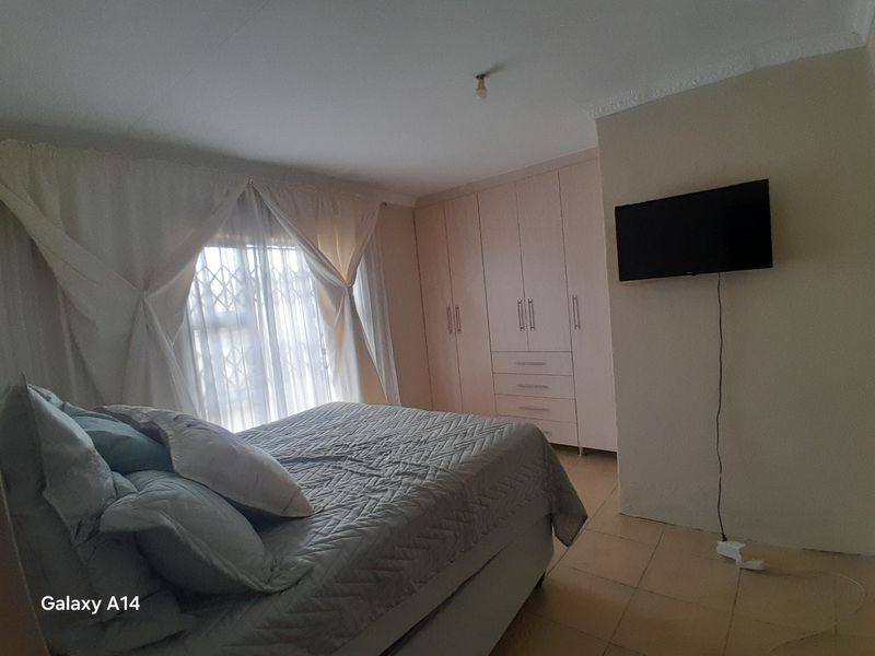 4 Bedroom Family Home with Security Cameras in Harmony Park Piet Retief - Photo 7