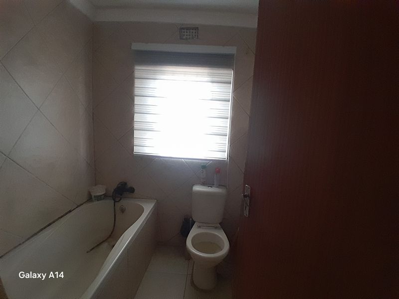 4 Bedroom Family Home with Security Cameras in Harmony Park Piet Retief - Photo 8