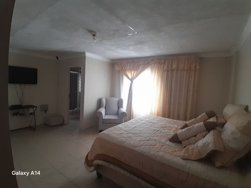 4 Bedroom Family Home with Security Cameras in Harmony Park Piet Retief - Photo 3