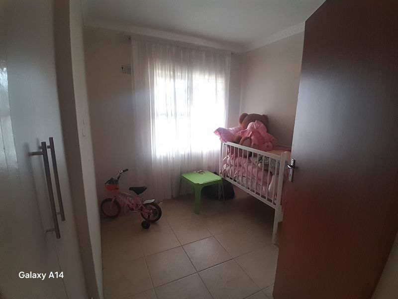 4 Bedroom Family Home with Security Cameras in Harmony Park Piet Retief - Photo 2