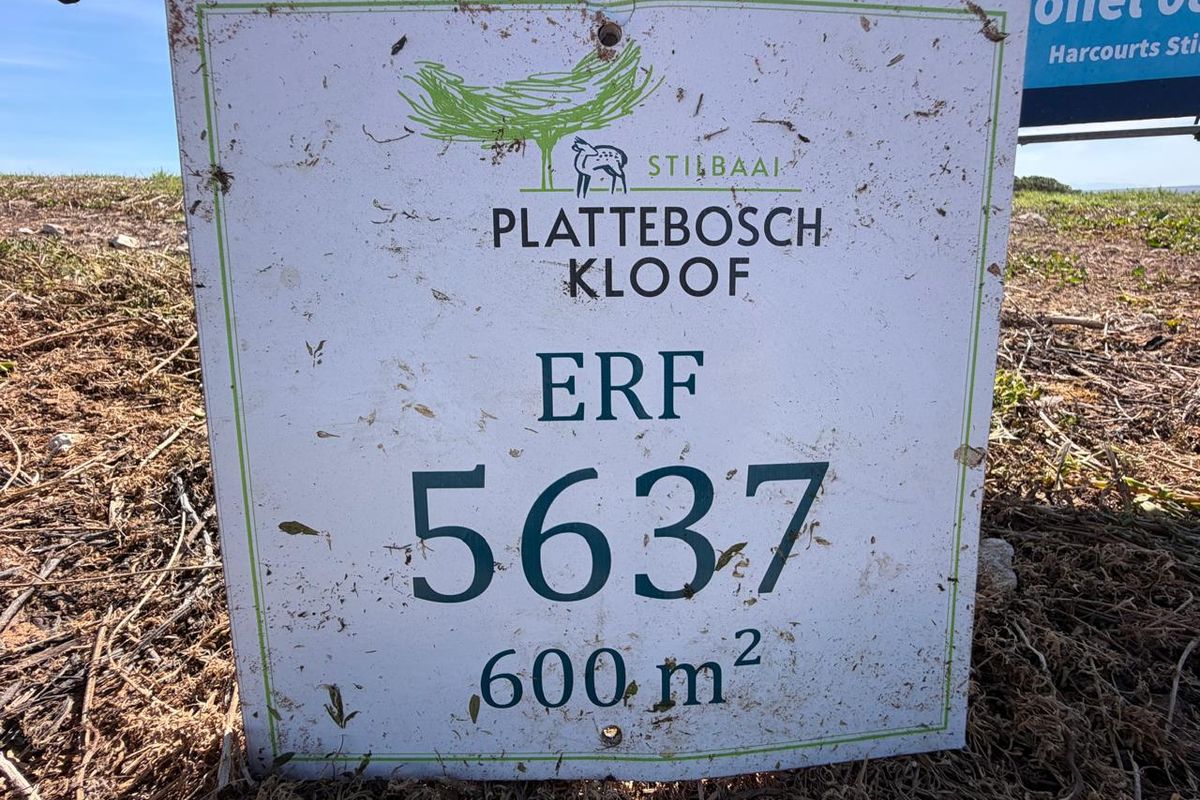 A real estate signage board displaying the erf number and size for a vacant residential plot in Plattebosch Kloof.