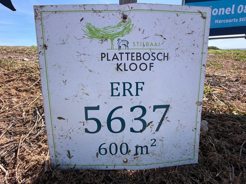A real estate signage board displaying the erf number and size for a vacant residential plot in Plattebosch Kloof.