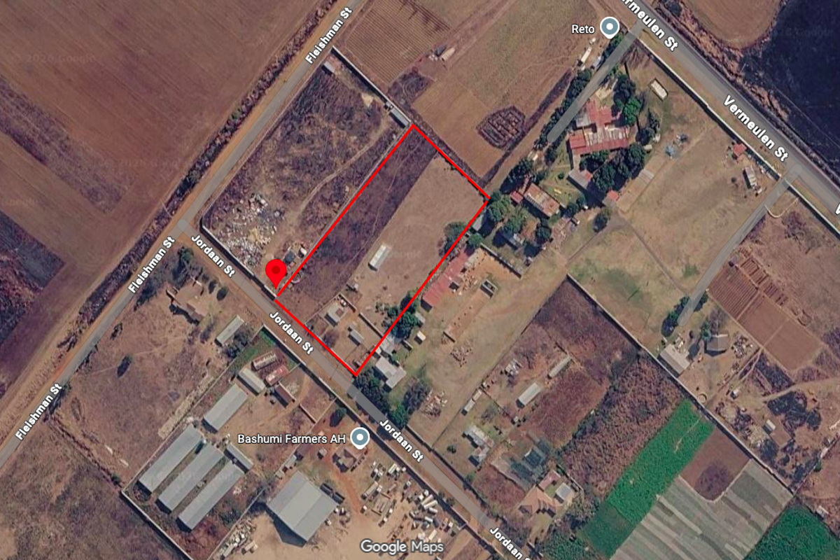 Aerial view of the small holding property showing the land boundaries, access roads, and surrounding agricultural area.