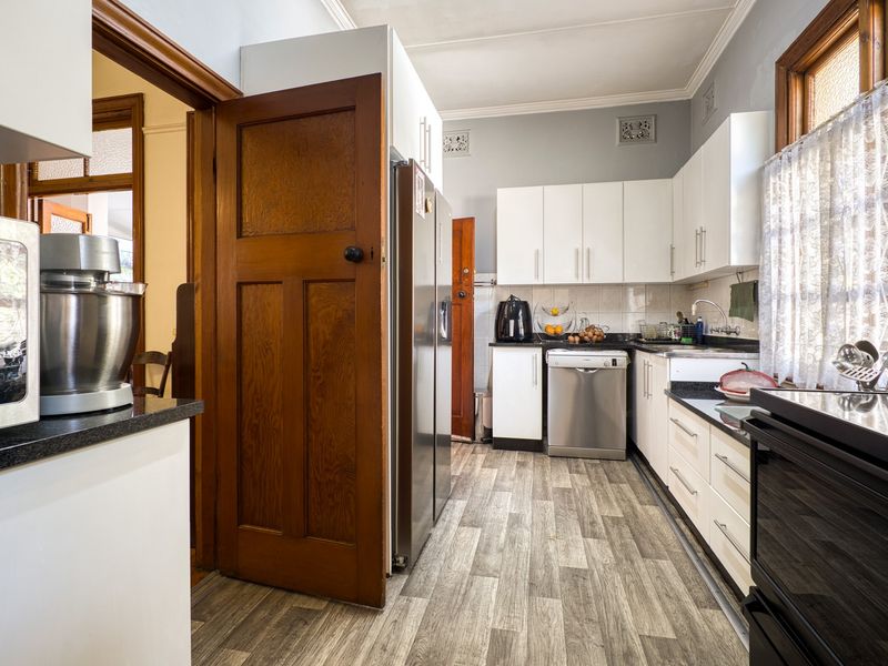 Timeless Family Home on Level, Beautifully Landscaped Ground - Photo 7