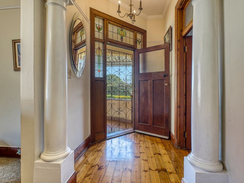 Timeless Family Home on Level, Beautifully Landscaped Ground - Photo 5