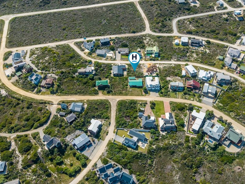 An aerial view of a residential development area showing the property location within the coastal landscape and surrounding road network.