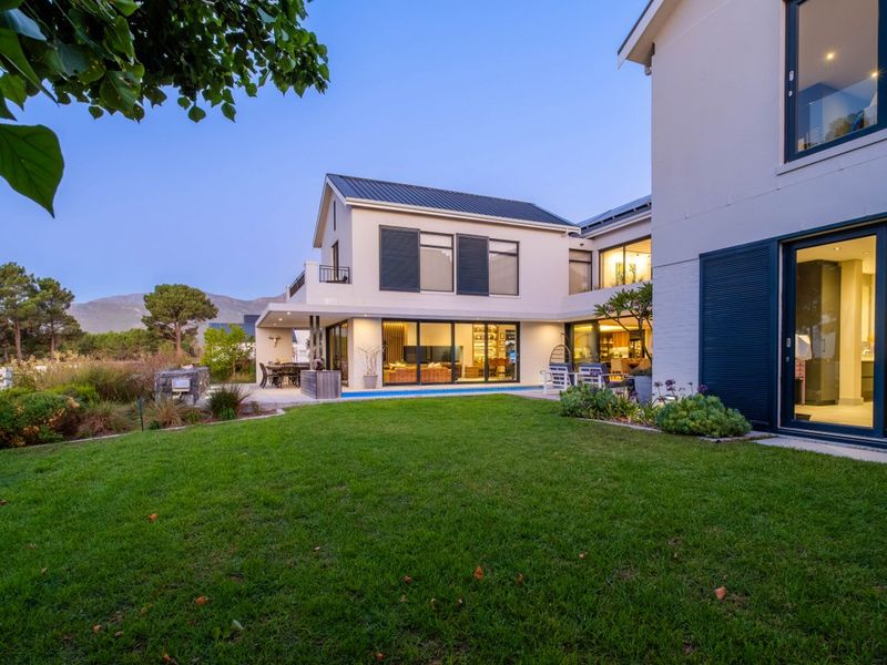 Modern North-Facing Family Home with Greenbelt Views - Photo 7