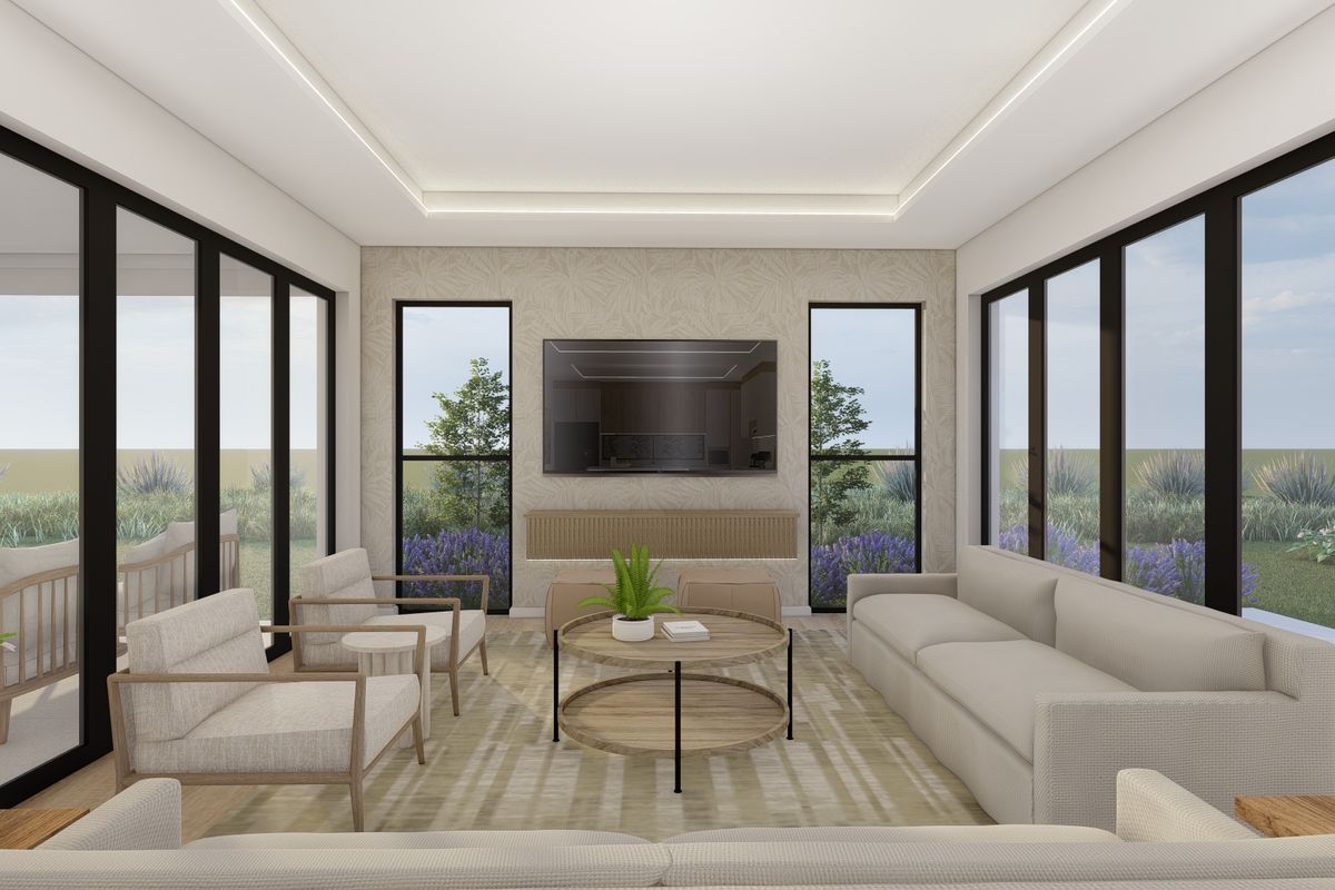 A modern, bright living room featuring large glass sliding doors, recessed ceiling lighting, and a built-in media console with elegant wallpaper.