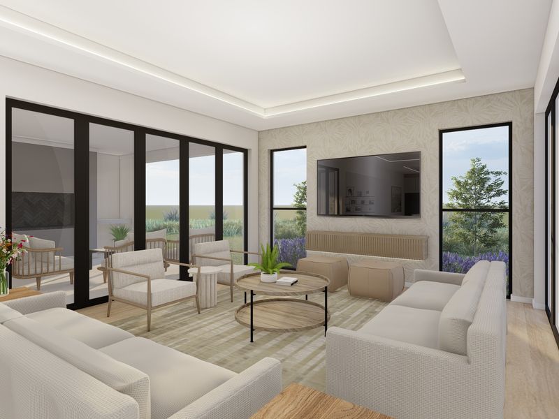 Modern living room featuring recessed ceiling lighting, large glass sliding doors, and a built-in media console with views of the garden.
