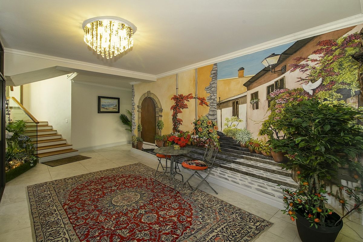 Exceptional Coastal Residence: Ocean Views, 9 Automated Garages, Workshop & Dual-Living Potential - Photo 5