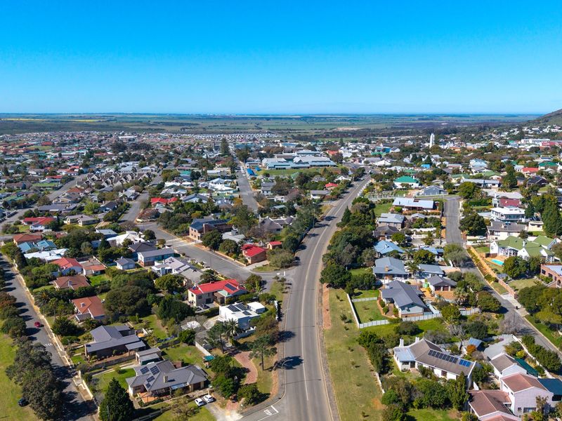 An aerial view of a residential neighborhood showing the surrounding road network and urban layout.