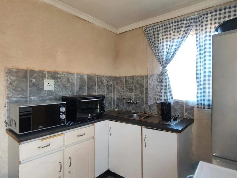 2-Bedroom Property with Great Potential - Photo 2