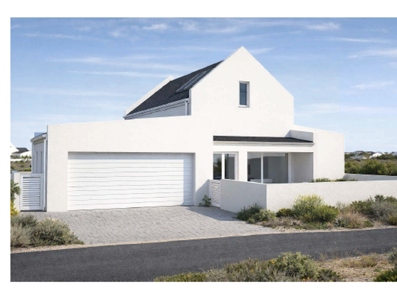 Modern white house exterior featuring a paved driveway, integrated garage, and solar panels under a clear blue sky.