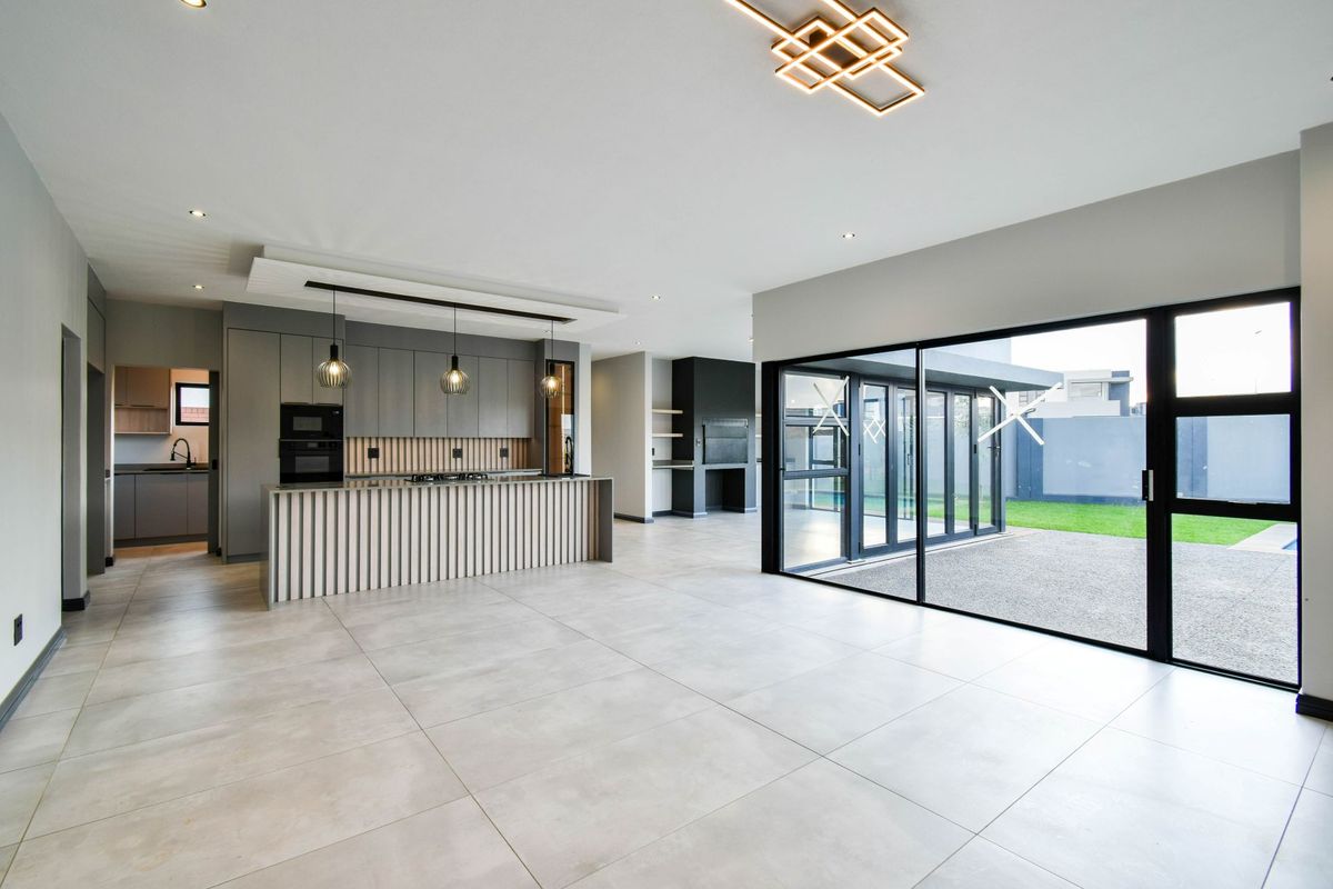 Contemporary Family Home with Stylish Comfort and Private Living - Photo 4