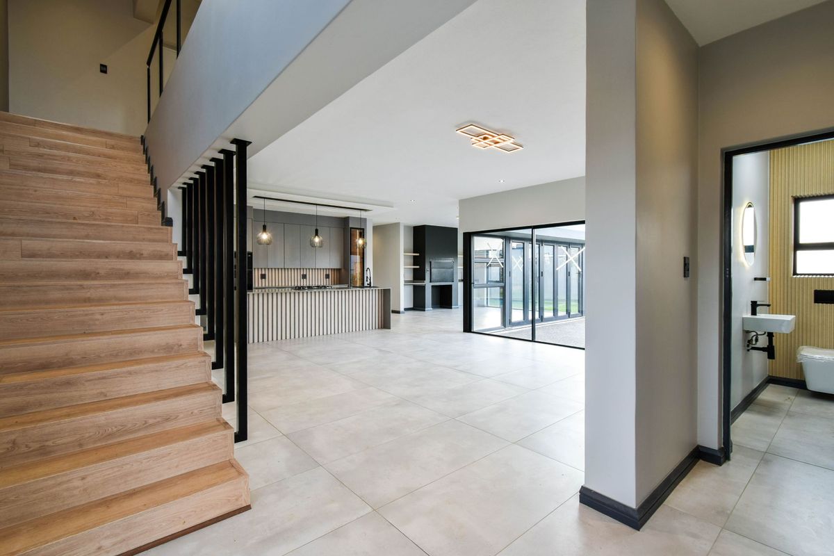 Contemporary Family Home with Stylish Comfort and Private Living - Photo 3