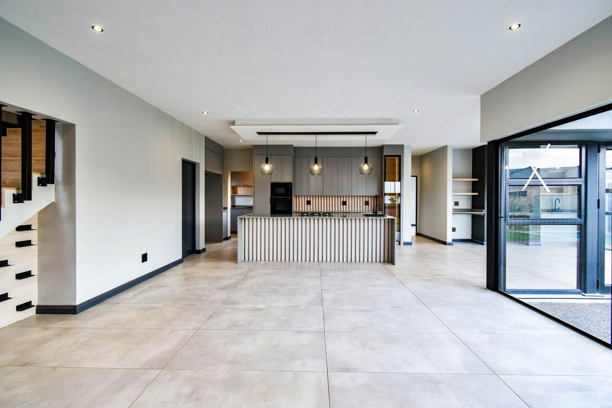 Contemporary Family Home with Stylish Comfort and Private Living - Photo 5