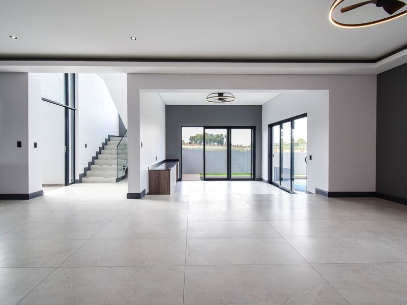 Spacious Double-Storey Home with Seamless Indoor-Outdoor Living - Photo 2