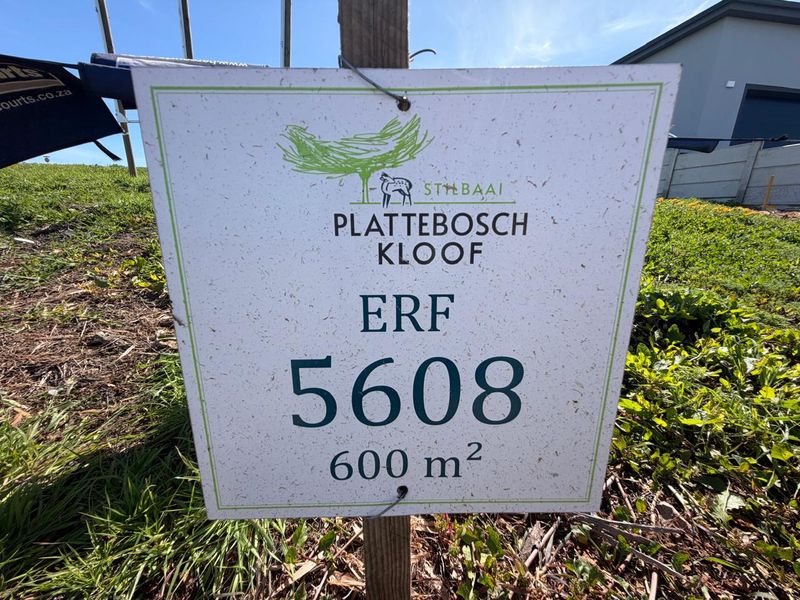 A close-up view of a real estate sign identifying Erf 5608, a 600 square meter residential plot in Plattebosch Kloof.