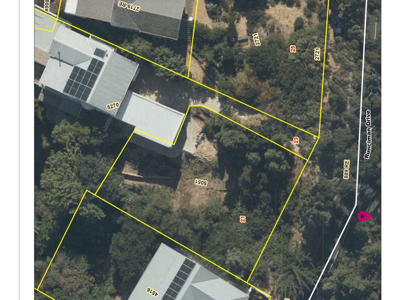 An aerial cadastral map showing the property boundaries and surrounding residential plots along Runciman Drive.
