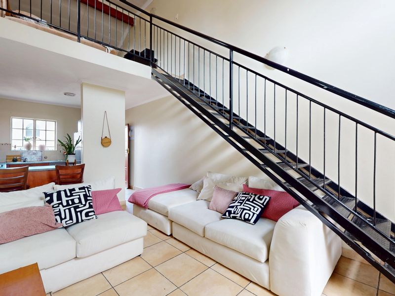 Stylish 2-Bedroom Unit with Loft & Entertainment Space - Photo 8