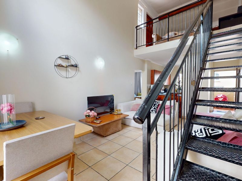 Stylish 2-Bedroom Unit with Loft & Entertainment Space - Photo 6