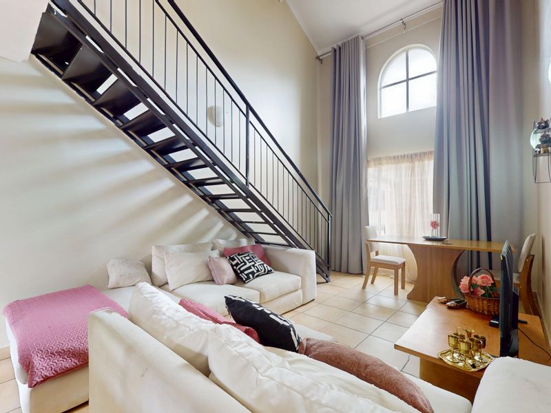 Stylish 2-Bedroom Unit with Loft & Entertainment Space - Photo 7