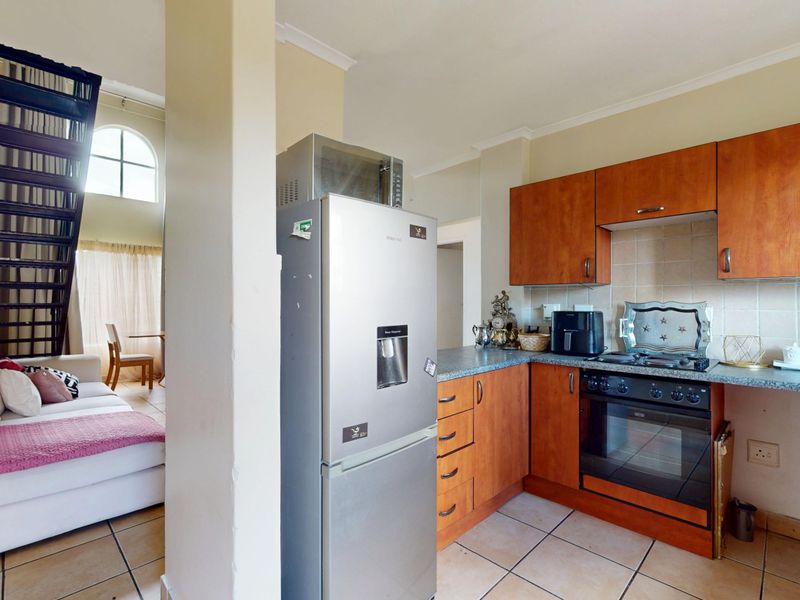 Stylish 2-Bedroom Unit with Loft & Entertainment Space - Photo 3
