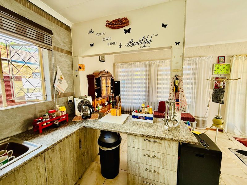 Welcoming Single Story Home with Pool and Modern Conveniences in Wolmer - Photo 10