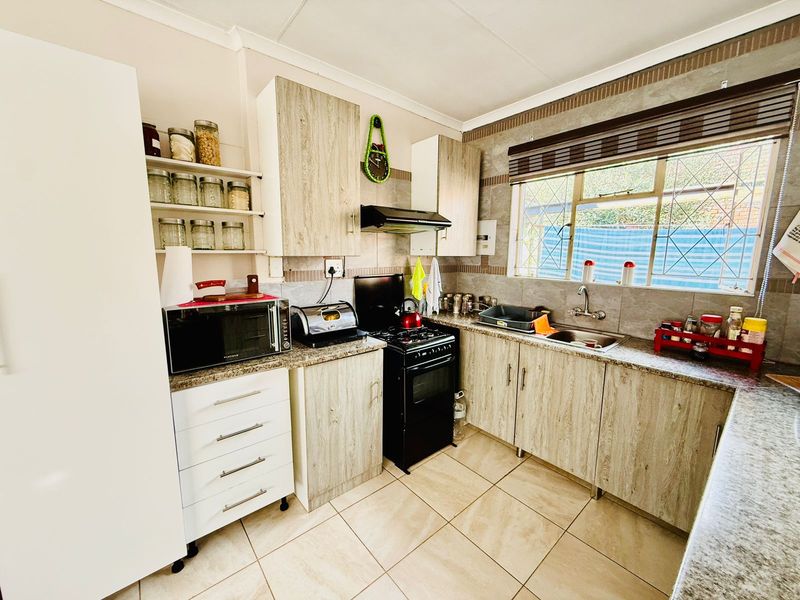 Welcoming Single Story Home with Pool and Modern Conveniences in Wolmer - Photo 9