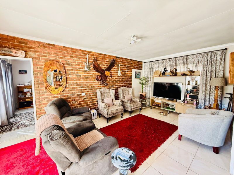 Welcoming Single Story Home with Pool and Modern Conveniences in Wolmer - Photo 5