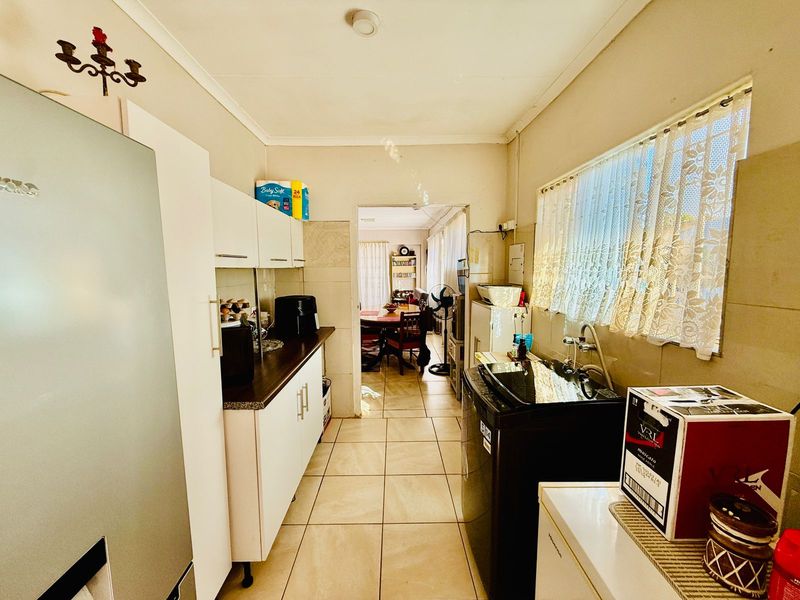 Welcoming Single Story Home with Pool and Modern Conveniences in Wolmer - Photo 7