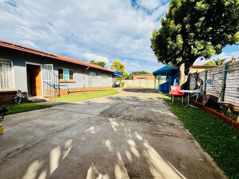 Welcoming Single Story Home with Pool and Modern Conveniences in Wolmer - Photo 3