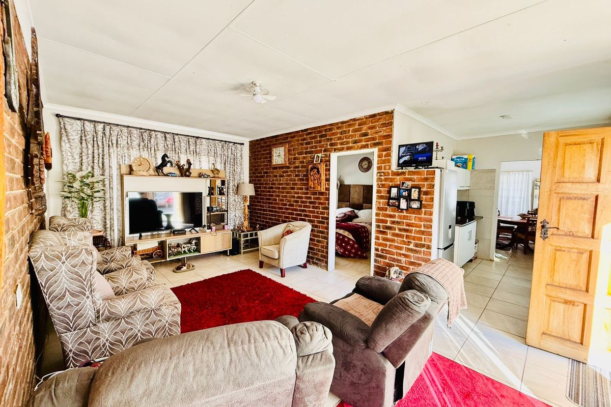 Welcoming Single Story Home with Pool and Modern Conveniences in Wolmer - Photo 4