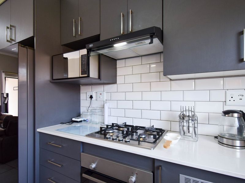 Stylish 3-Bedroom Townhouse with Modern Finishes and Easy Living - Photo 10