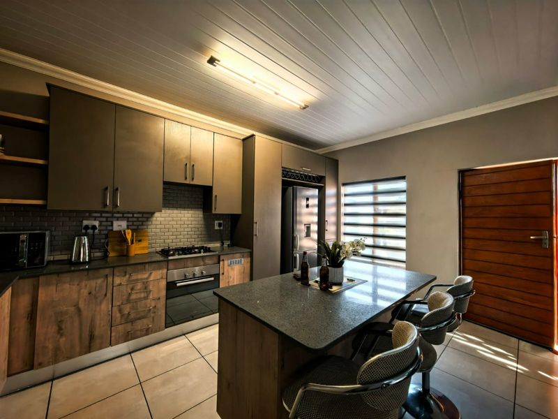 Modern Townhouse Living in Peaceful Christiaanville AH - Photo 8