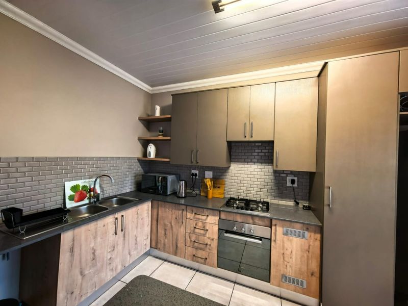Modern Townhouse Living in Peaceful Christiaanville AH - Photo 6