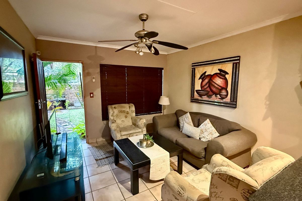 Delightful Garden Townhouse Offering Comfort and Convenience - Photo 2