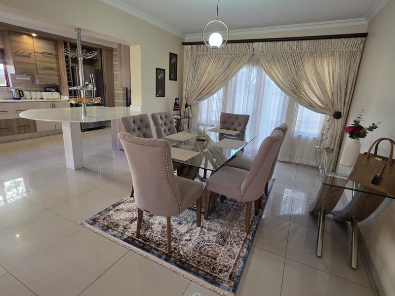 Elegant Modern Living in Sought-After Rose Acres Estate - Photo 6