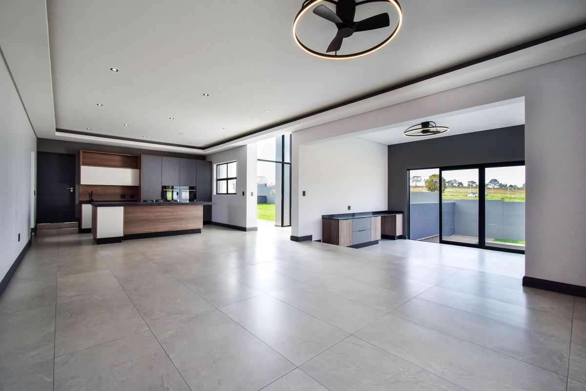 Spacious Double-Storey Home with Seamless Indoor-Outdoor Living - Photo 2