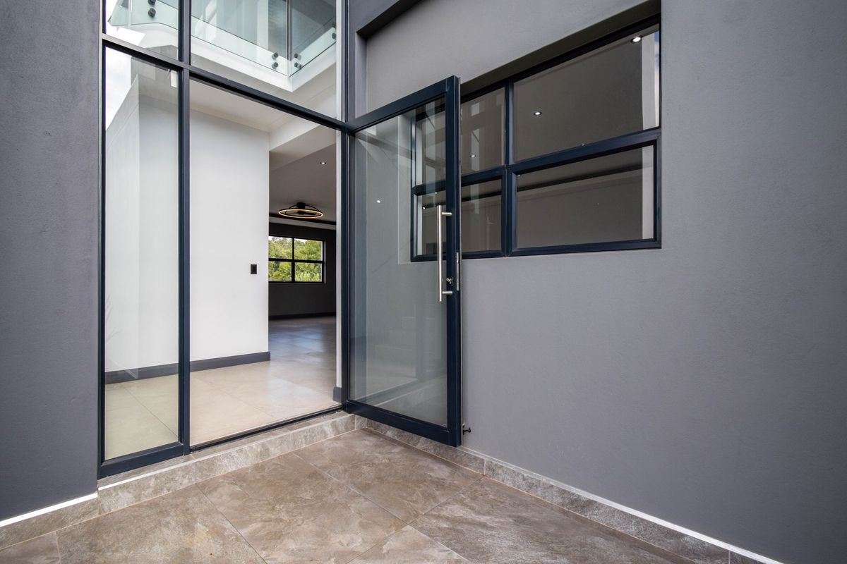 Spacious Double-Storey Home with Seamless Indoor-Outdoor Living - Photo 5