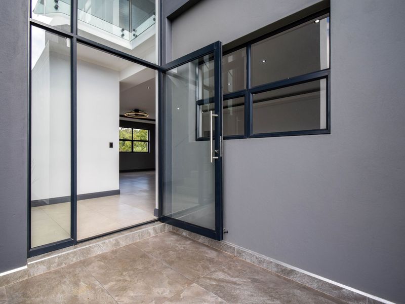 Spacious Double-Storey Home with Seamless Indoor-Outdoor Living - Photo 5