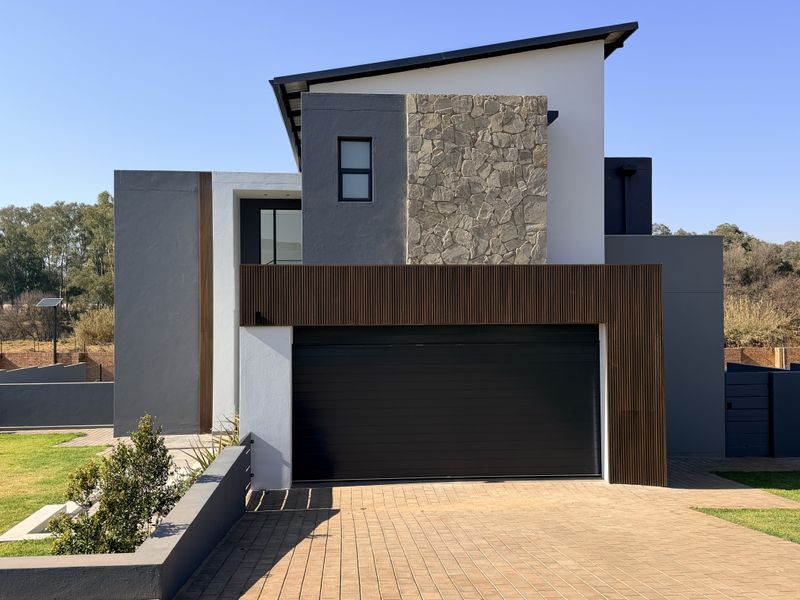 Spacious Double-Storey Home with Seamless Indoor-Outdoor Living - Photo 1