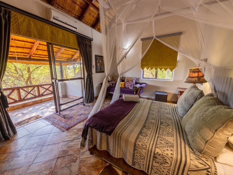 Elegant 4 Bedroom Double Story Bush Escape - Photo 9