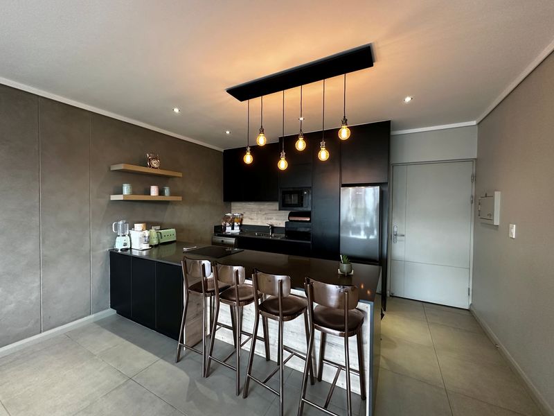 Sophisticated Waterside Living in the Heart of Midstream - Photo 9