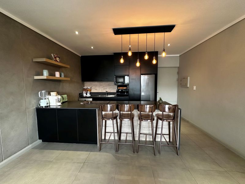 Sophisticated Waterside Living in the Heart of Midstream - Photo 8